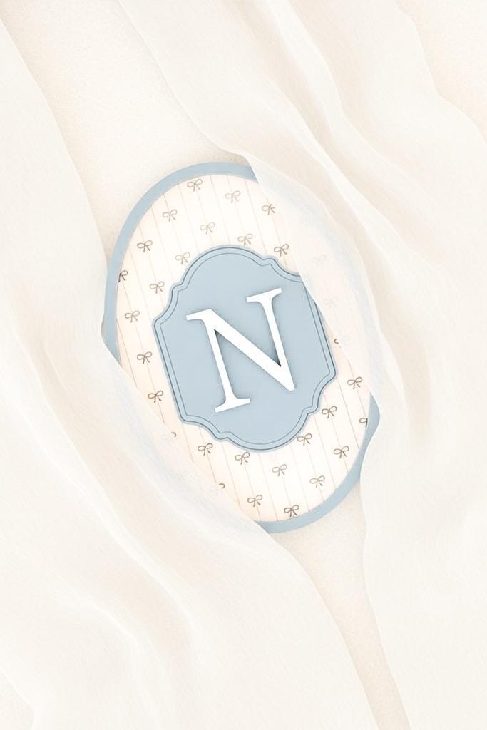 Decorative monogram with the letter 'N' on a light background
